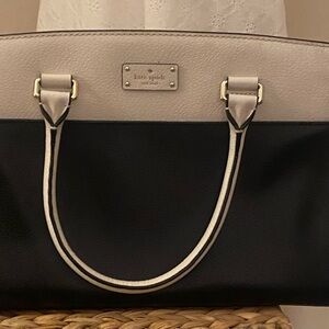 Elegant Kate Spade Black and White Women's Handbag .